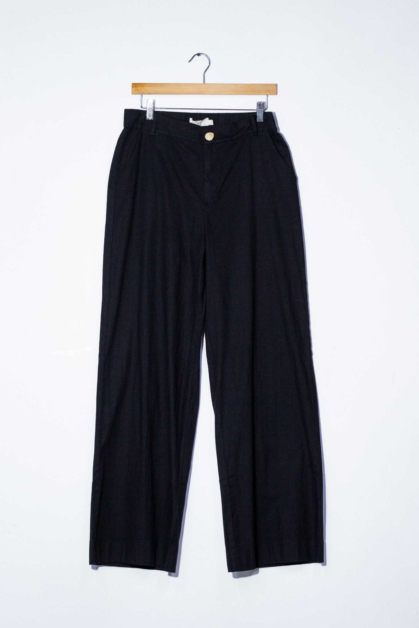 Pantalon lino con cinto negro