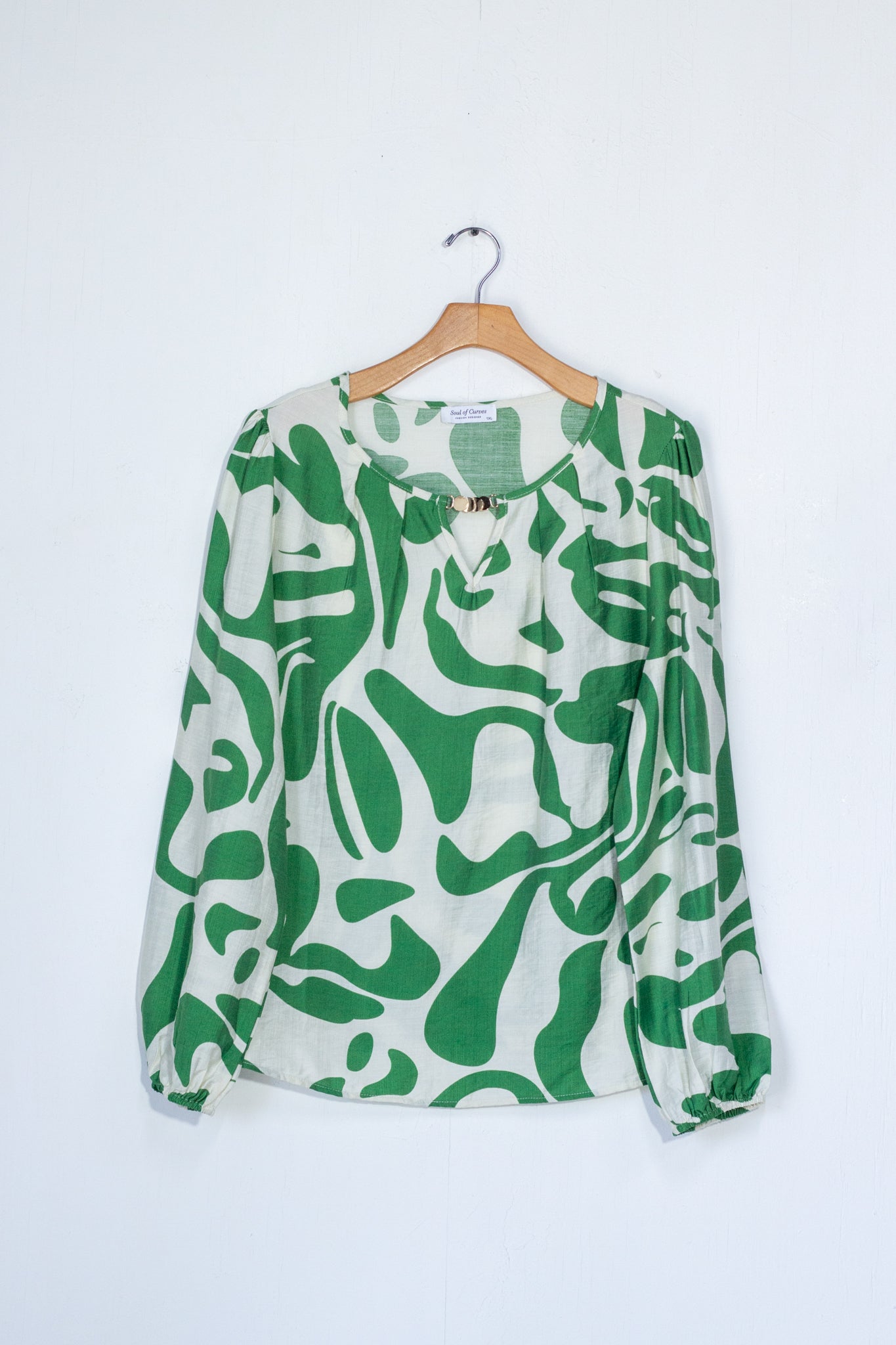Blusa estampada c/hebilla dorada