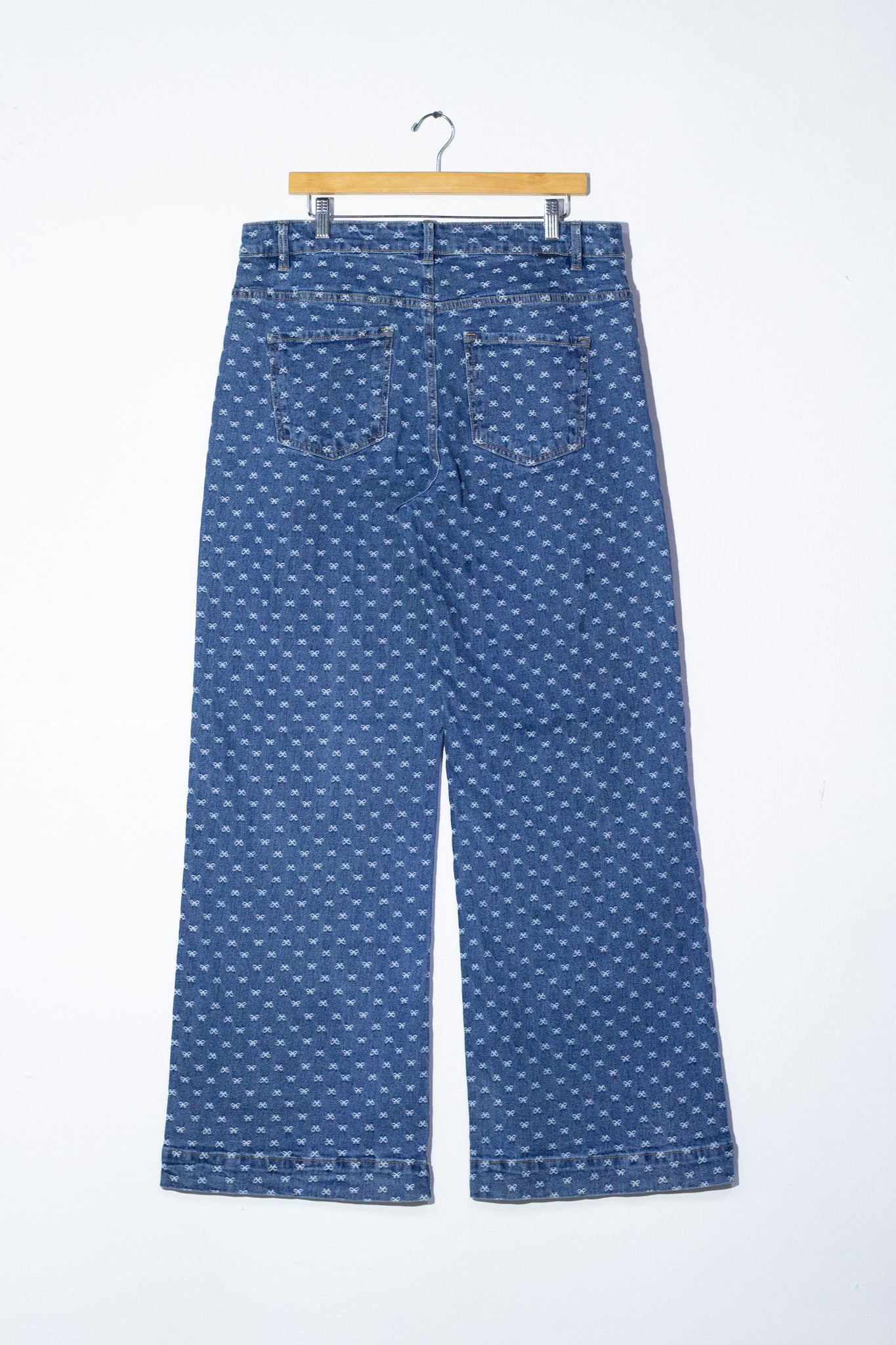 Jeans wide leg print moños cla