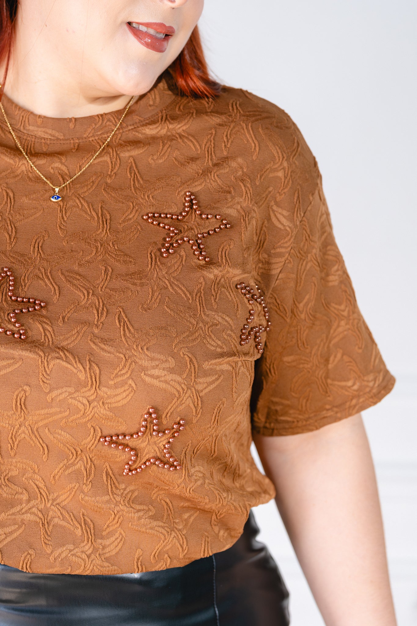 Blusa textura estrellas cafe