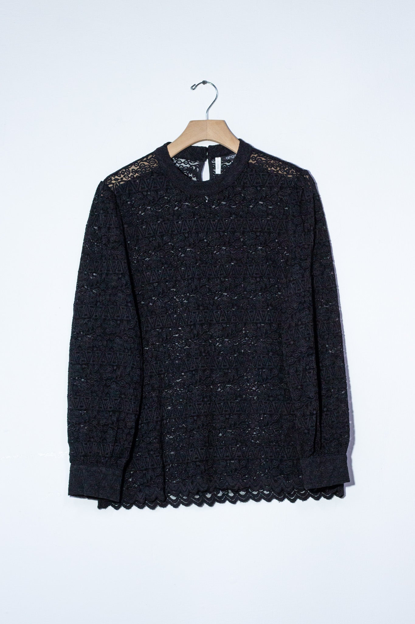 Blusa manga larga encaje negra