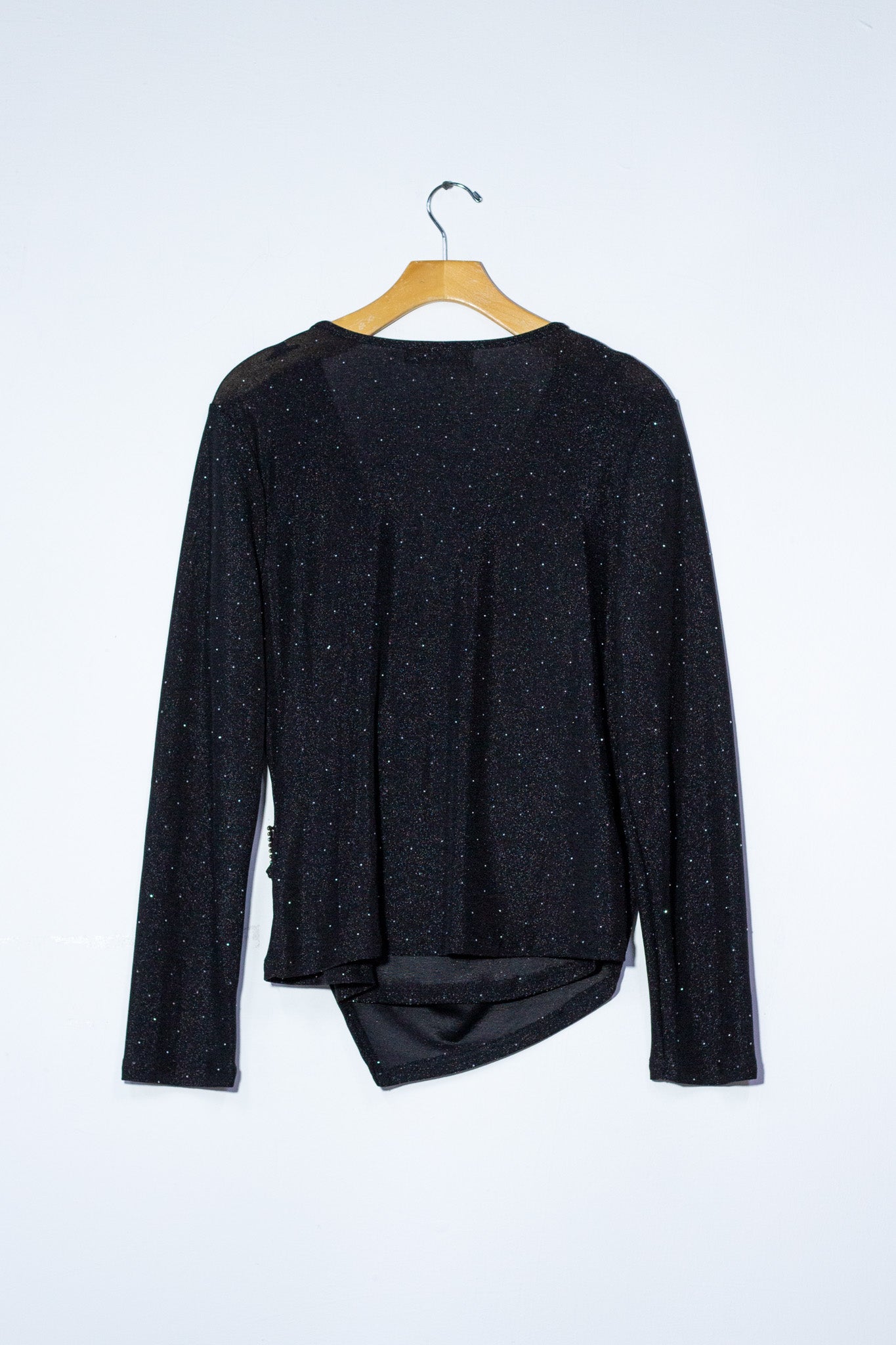 Blusa manga larga brillos negra