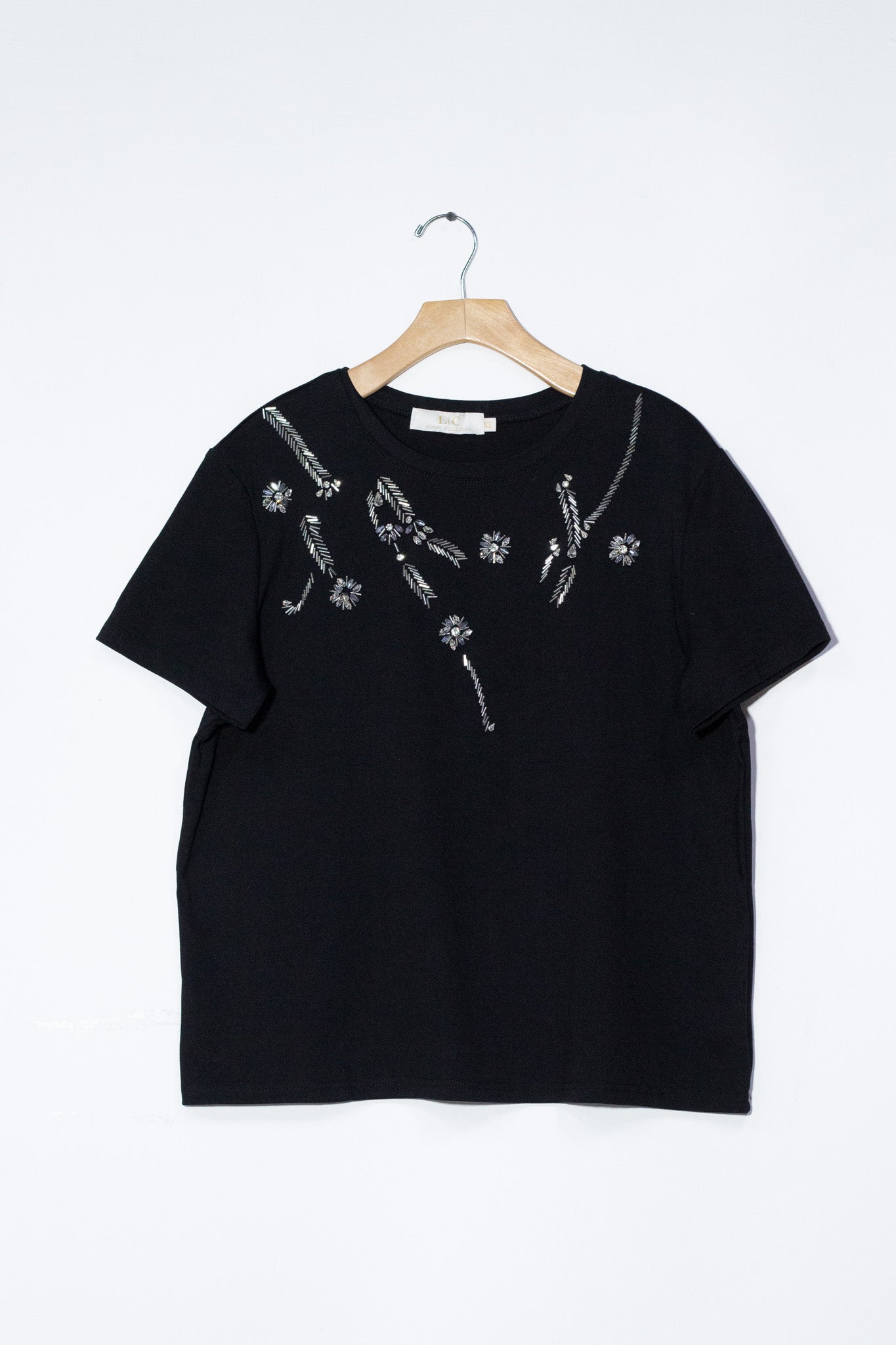 Blusa con piedras negra