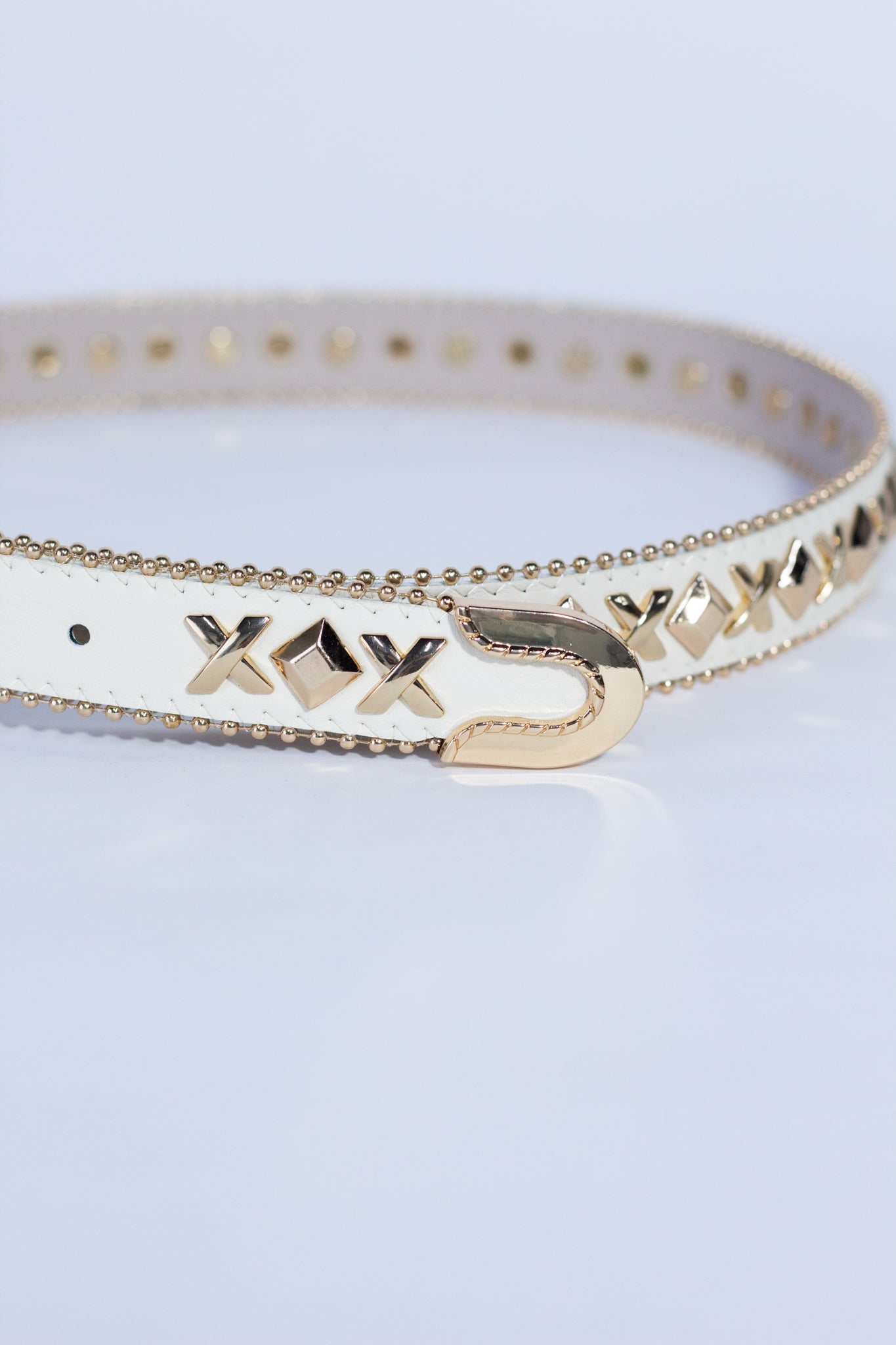 Cinto c/estoperoles en cruz