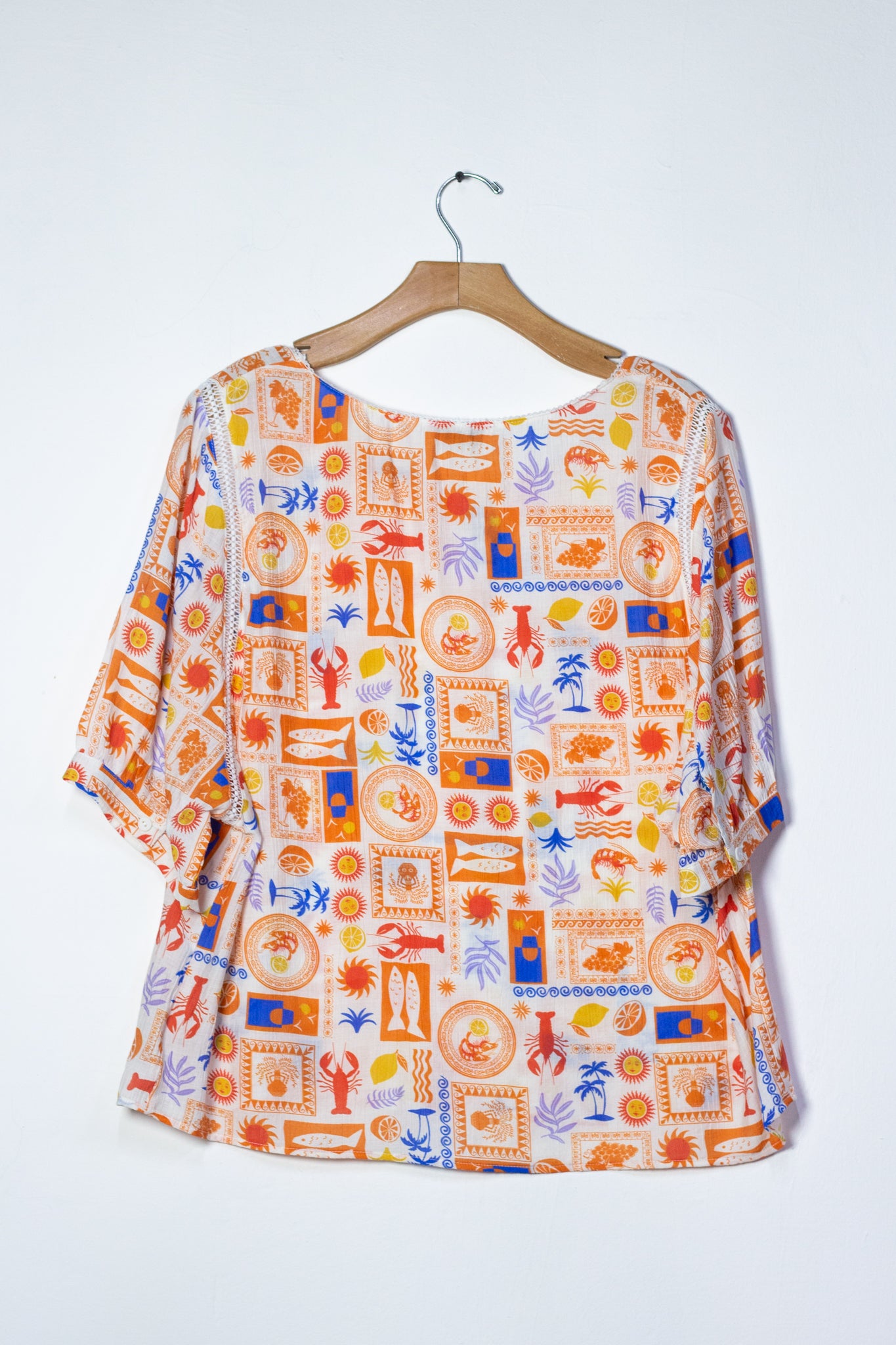 Blusa talabera naranja