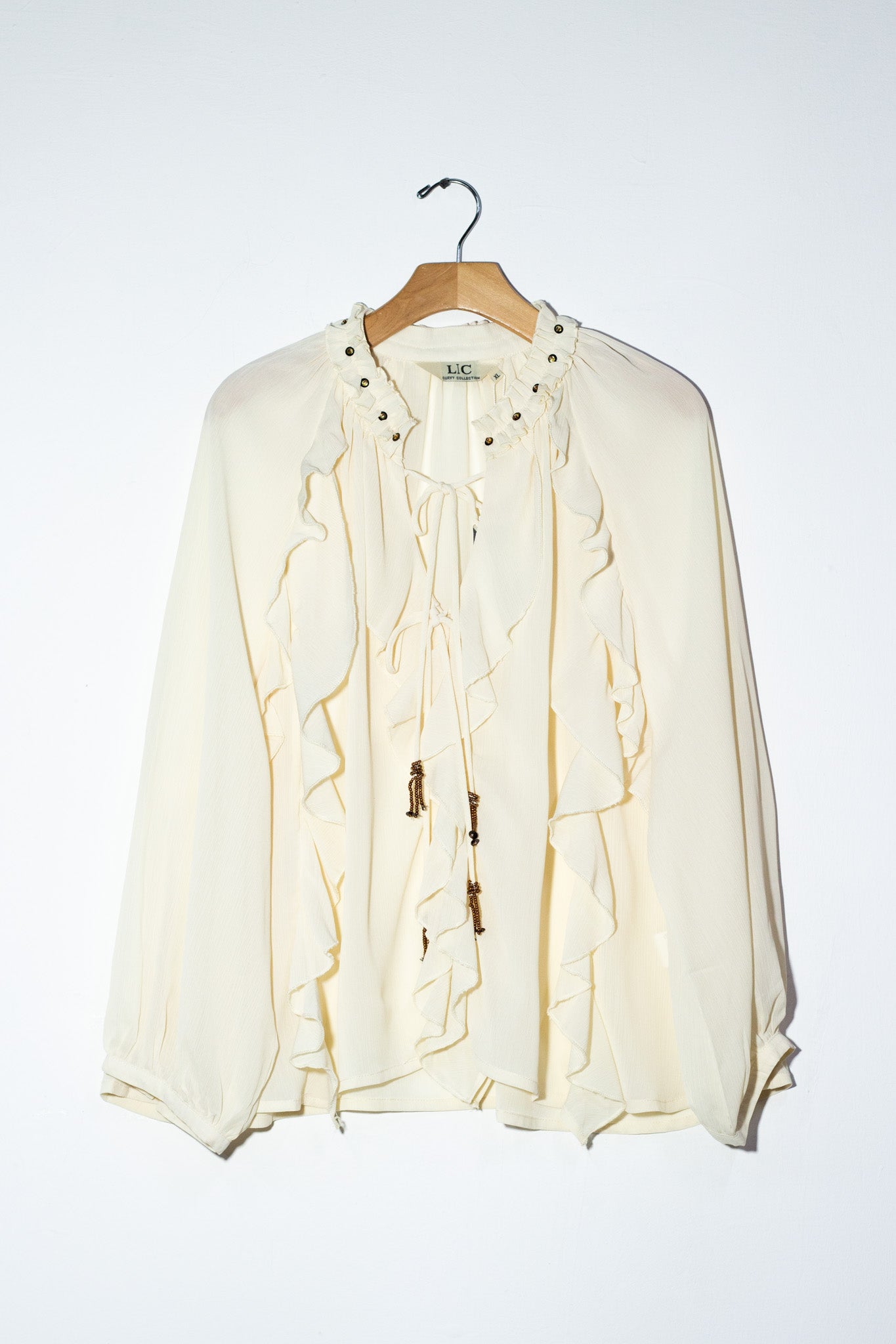 Blusa bohemia con escarolas bei