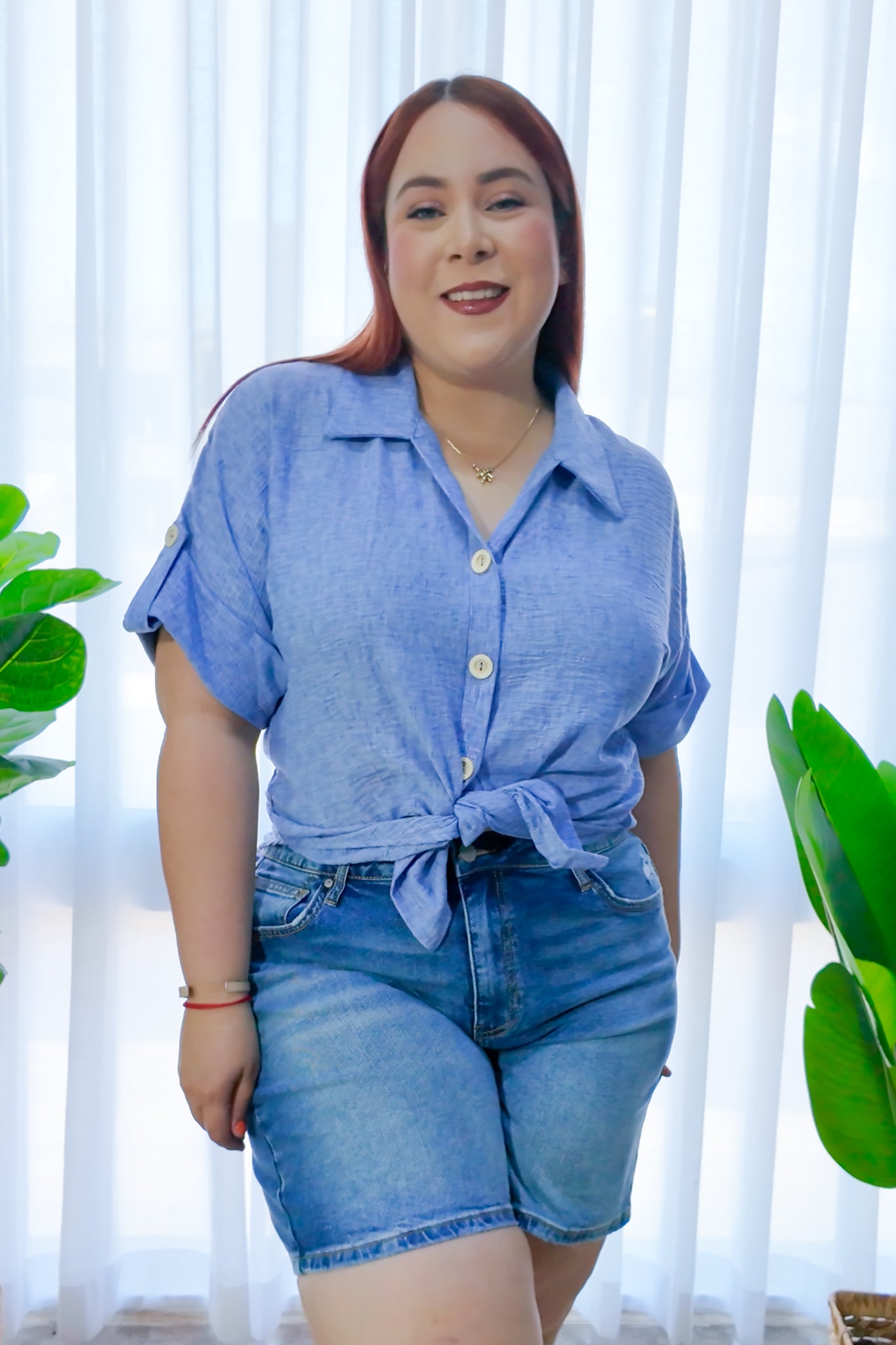 Blusa lisa detalle boton