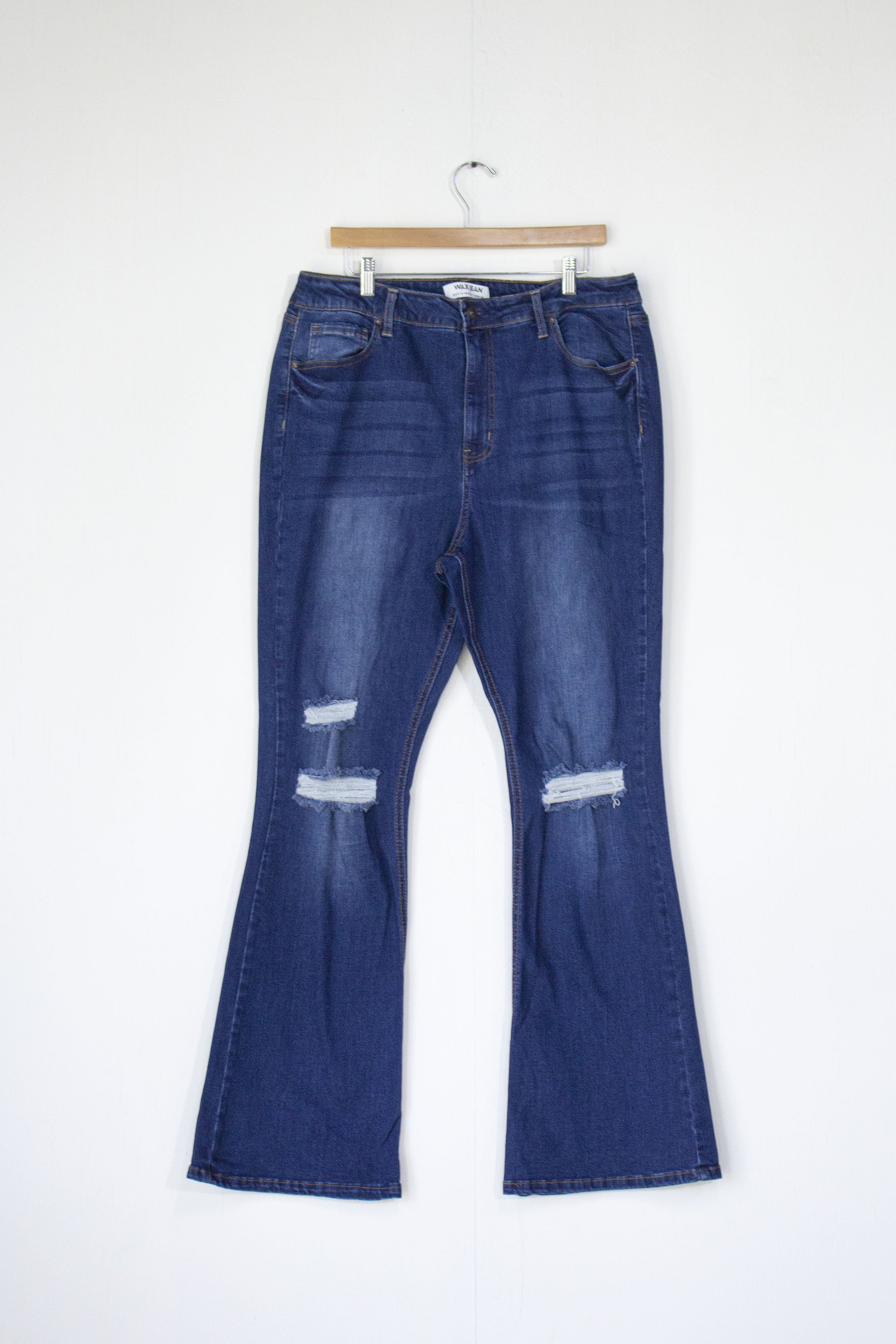 Jeans flare rasgado