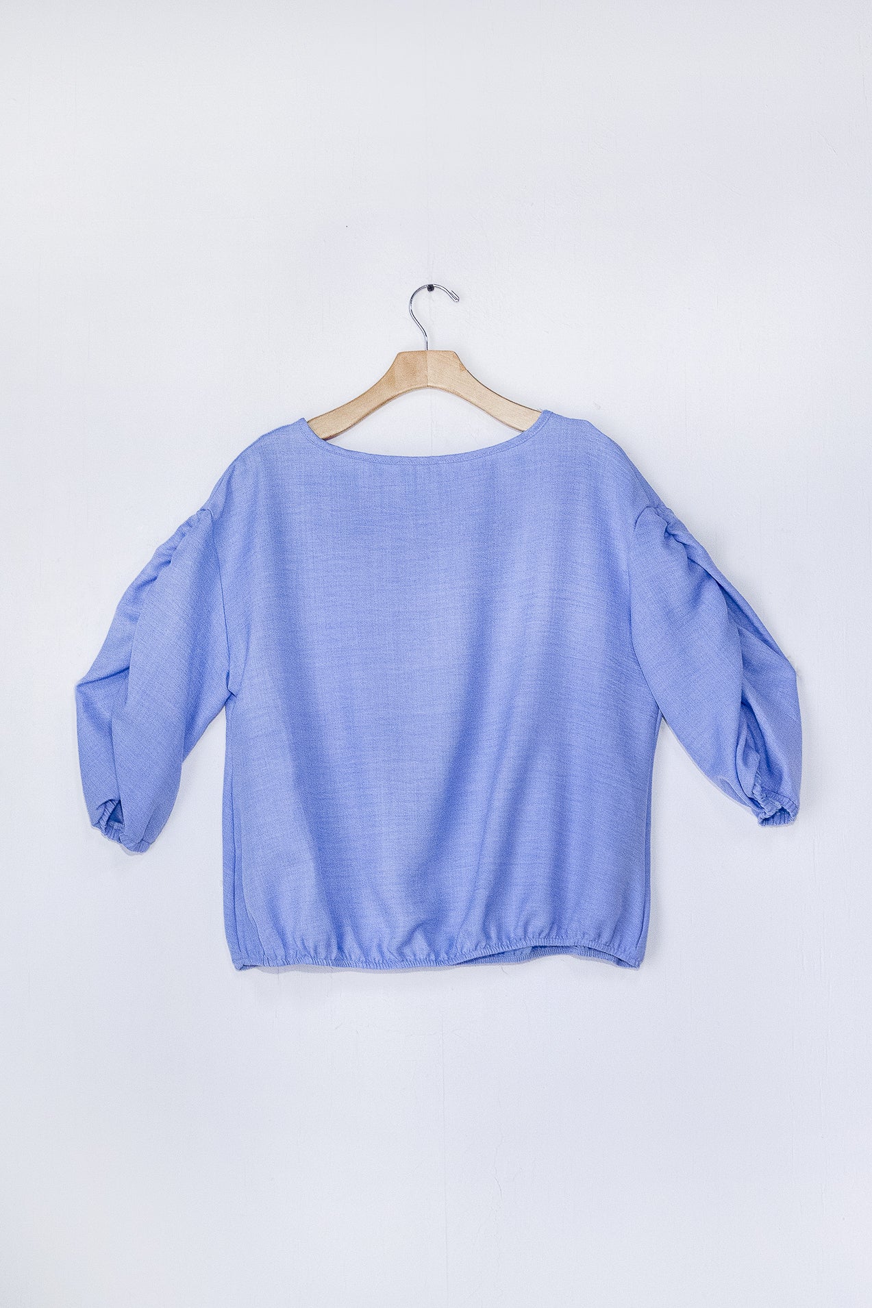 Blusa Lisa Abullonada