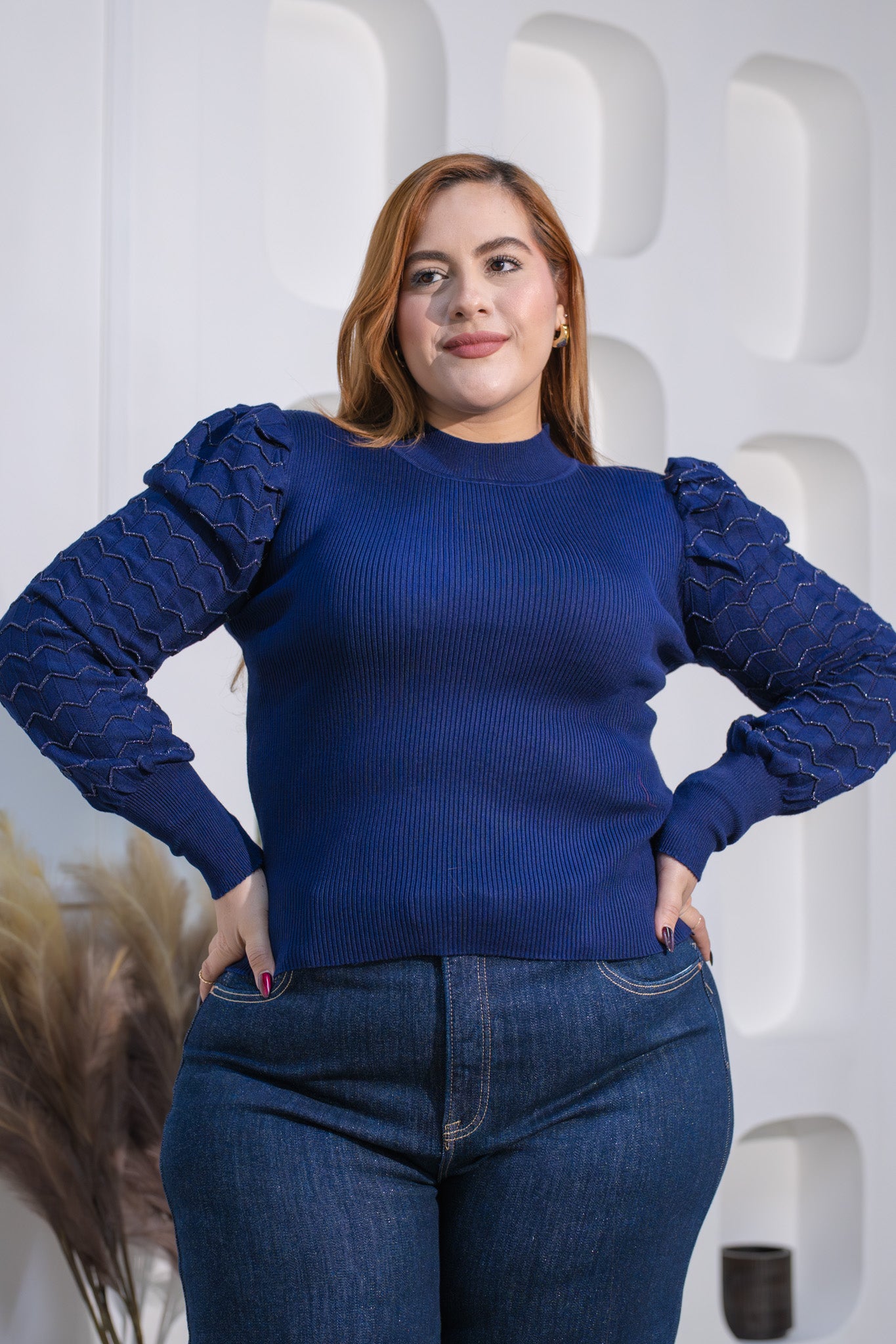 Suéter abullonado azul