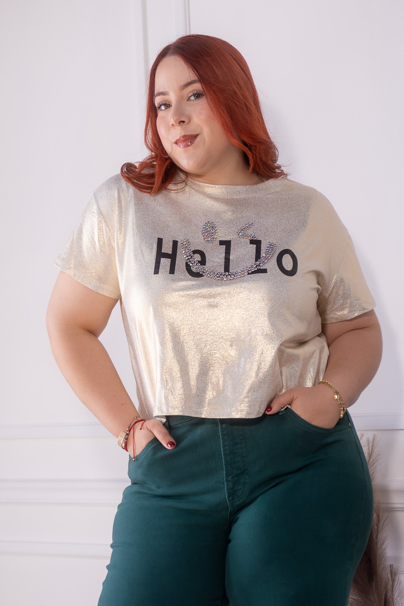 Blusa metalica hello dorada