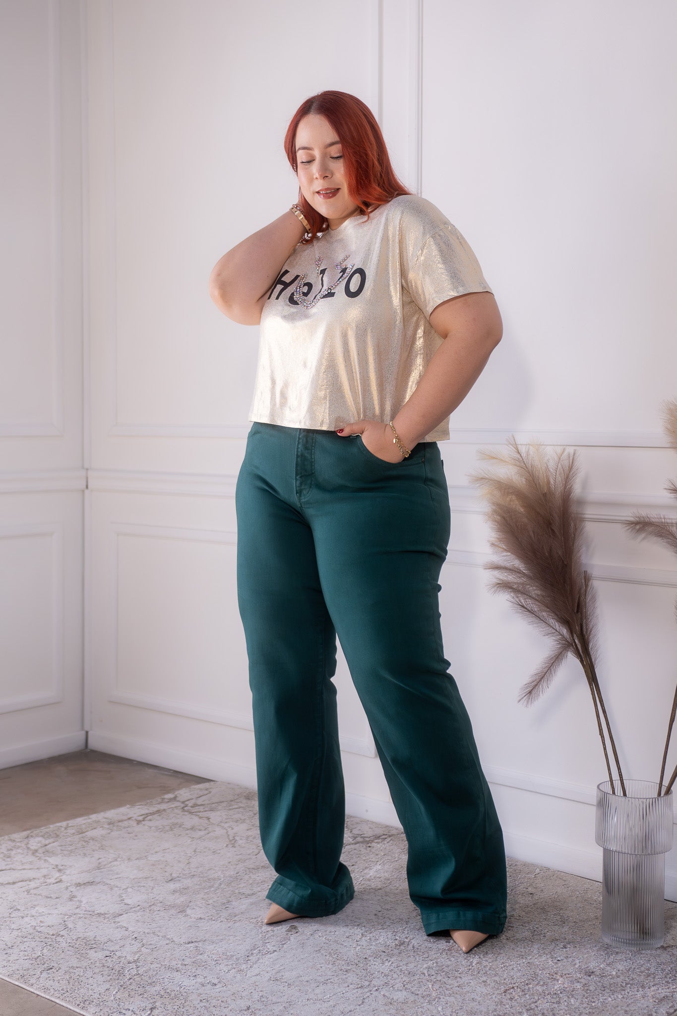 Blusa metalica hello dorada