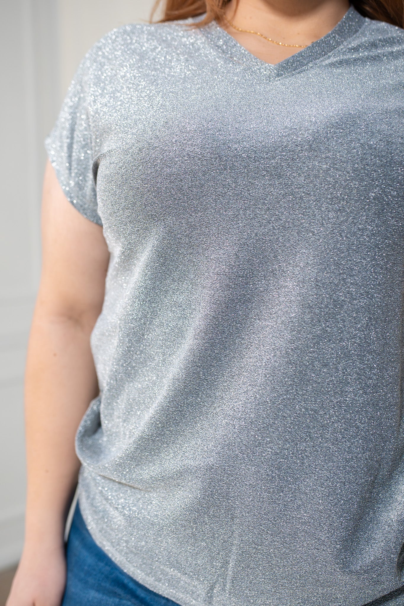 Blusa brillos plata