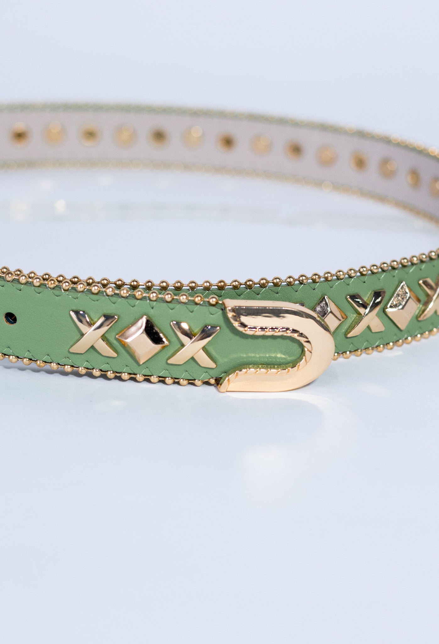 Cinto c/estoperoles en cruz