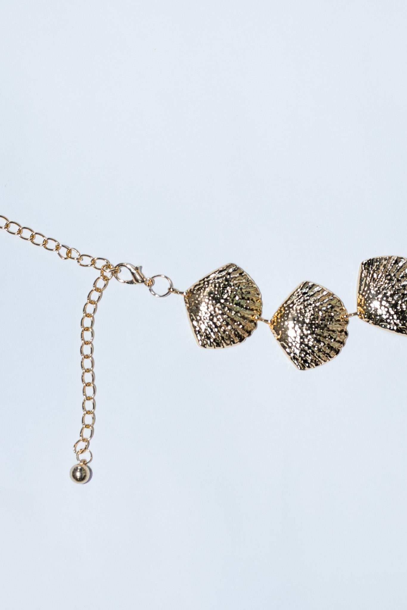 Cinto cadena conchas dorado